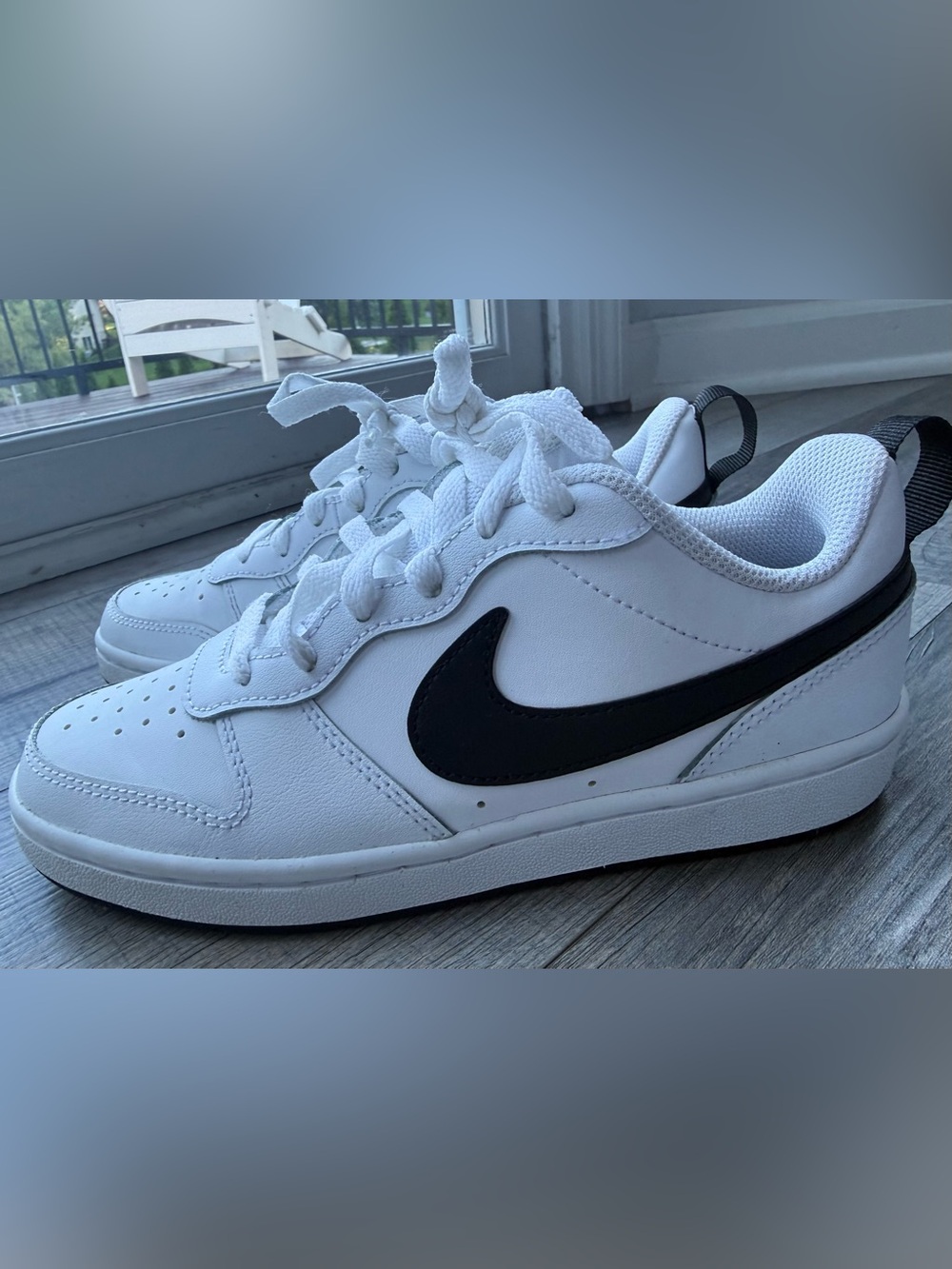 Nike big Kids court borough White Low-Top Sneakers with Black Swoosh